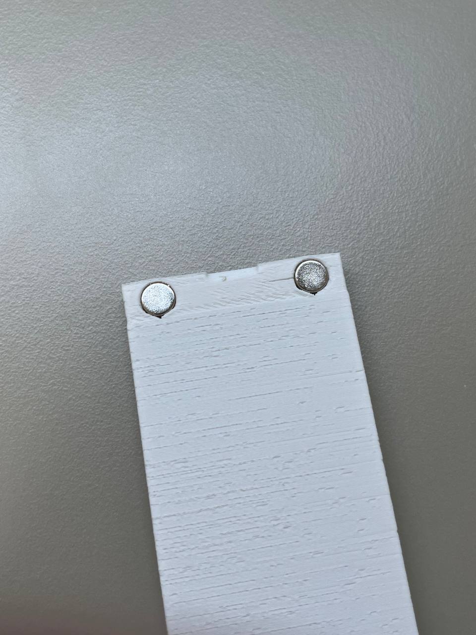 Shell with fixed magnets holes